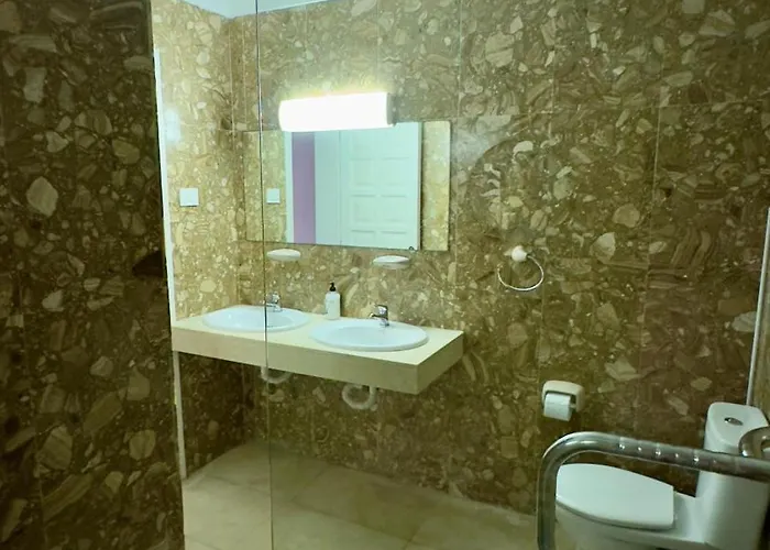 Island Village Апартаменты Адехе